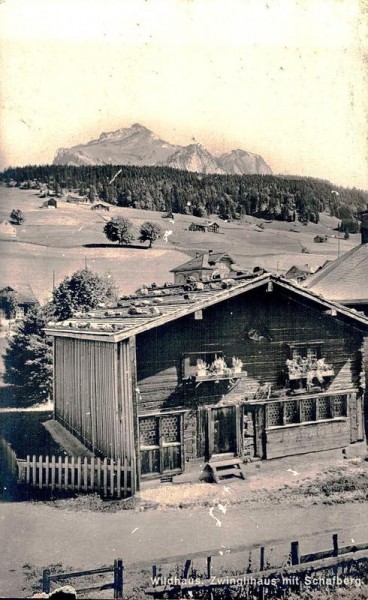 Wildhaus. Zwinglihaus mit Schafberg Vorderseite