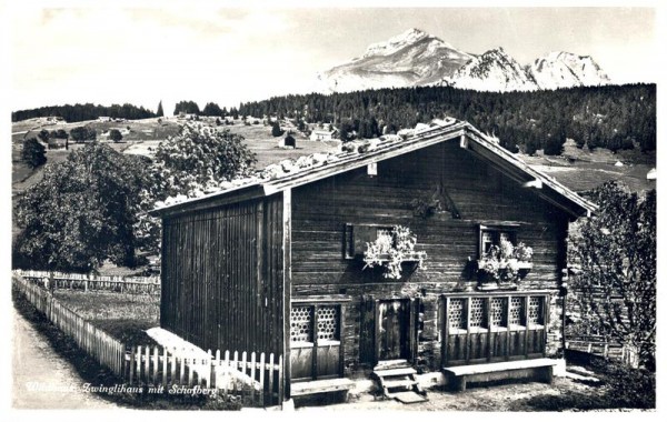Wildhaus. Zwinglihaus mit Schafberg Vorderseite