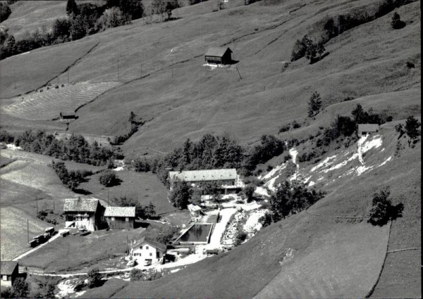 Oberiberg, Alpinahaus und Schwimmbad, Flugaufnahme Vorderseite