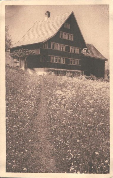 Frühling und Sommer. Haus mit Wiese. Photostudien Hausamann  Vorderseite