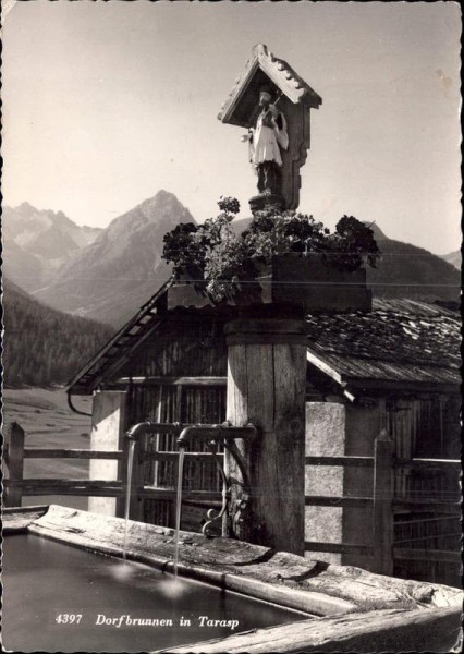 Dorfbrunnen in Tarasp Vorderseite