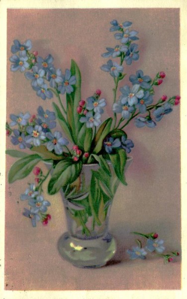 blaue Blumen in Glasvase Vorderseite