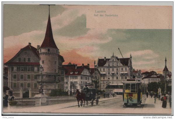 Luzern - Auf der Seebrücke mit Tram und Kutsche